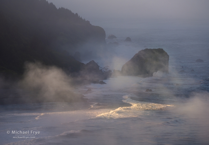 Waves, fog, and rocky coast, northern California, USA
