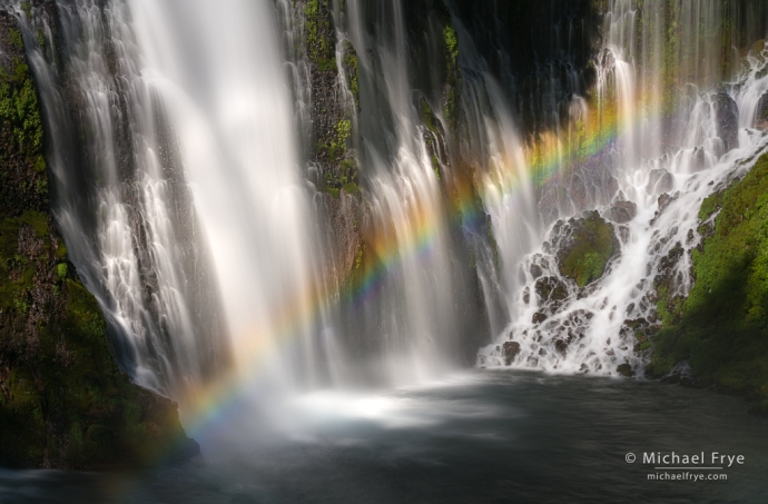 Rainbow and waterfall, northern California, USA