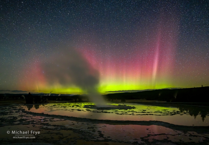 Geyser and aurora, Yellowstone NP, WY, USA