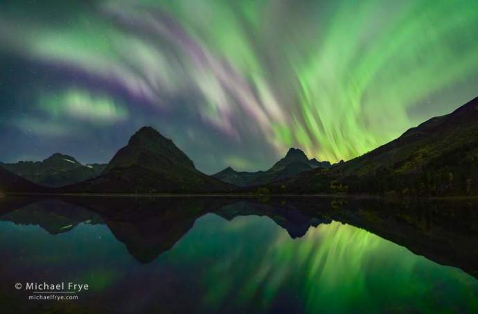 Aurora reflected in Swiftcurrent Lake, Glacier NP, MT, USA