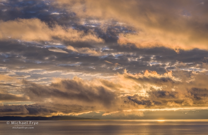 Clouds and fog breaking up at sunrise, Mono Lake, CA, USA