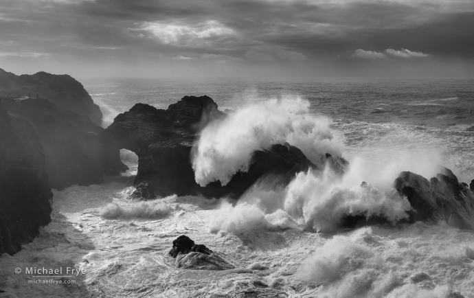 Natural bridge and crashing wave, Oregon Coast, USA