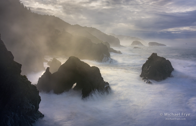 Sunlight breaking through clouds and fog, Oregon Coast, USA