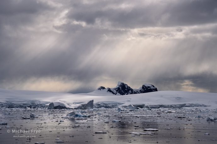 Sunbeams, mountains, and icebergs, Antarctica