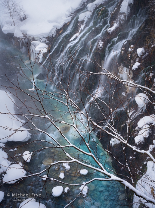 Waterfall and snow-covered branches, Hokkaido, Japan